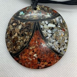 Beautiful crushed sea shell necklace. Take the beach with you. Very lightweight